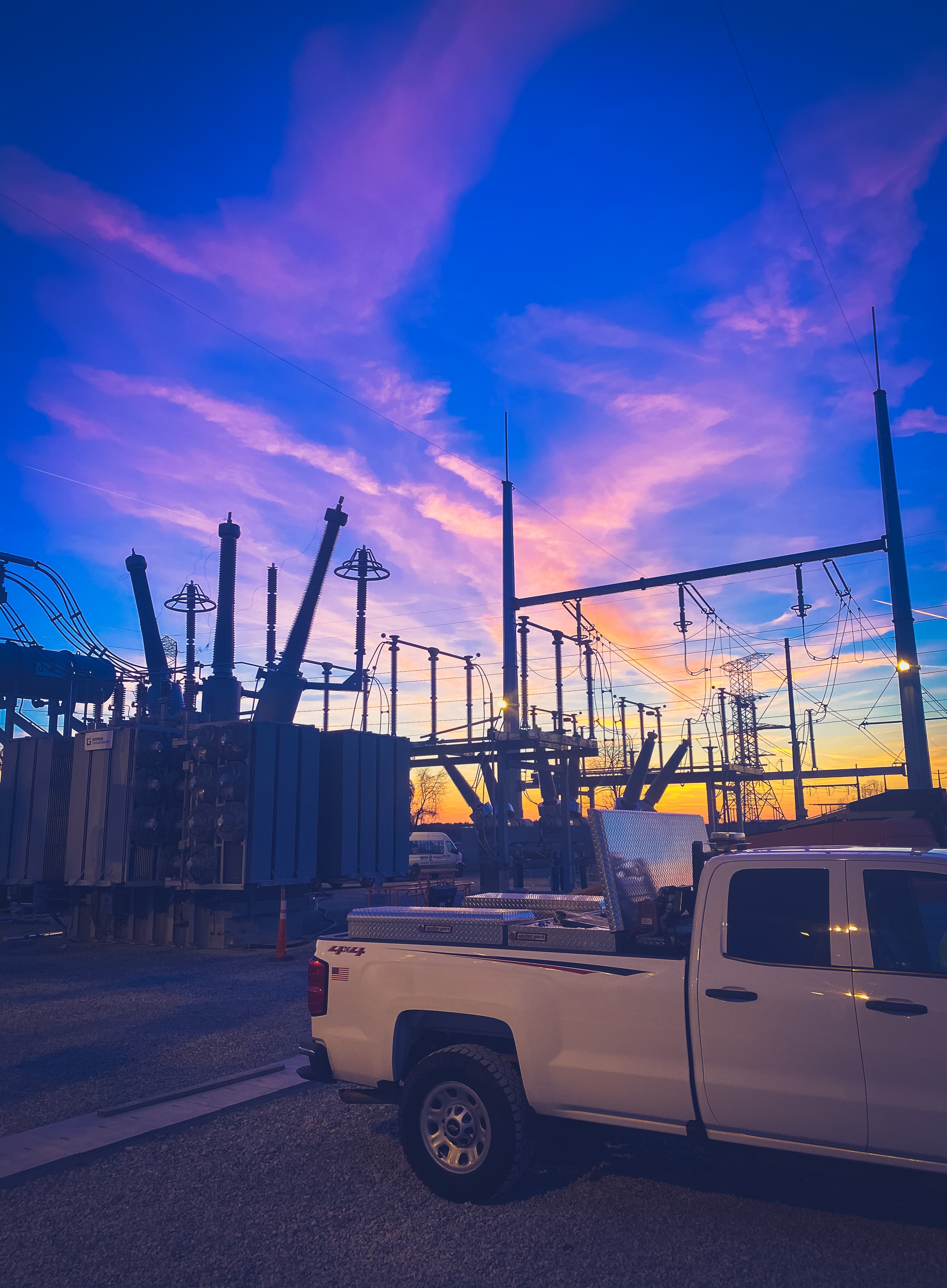 ClarkTE crew at a substation at sunset